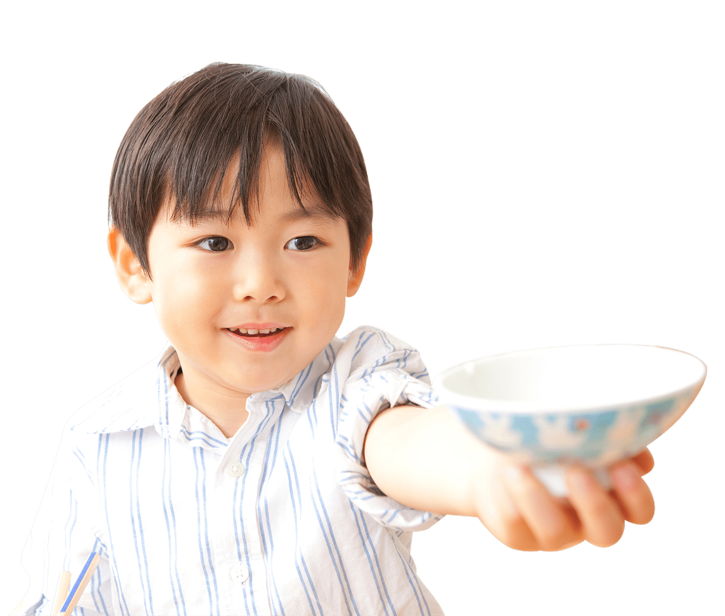 ご飯をおかわりしている男の子